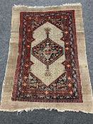 An antique Serapi rug 145 cm x 105 cm