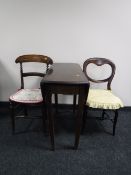 An antique mahogany drop leaf kitchen table together with a balloon back chair and one other