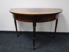 A George III d-shaped mahogany hall table, width 106cm.