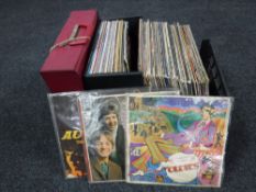 A crate of LP records mainly pop and rock - The Beatles, Small Faces, The Who,