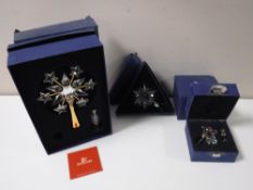 Three boxed Swarovski Crystal Christmas decorations - star,