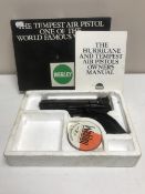 A boxed Webley Tempest air pistol with instruction manual and a tin of pellets