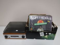 A retro style turn table and a box of LP records & 78's - Frank Sinatra etc