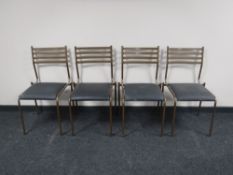 A set of nine metal framed stacking chairs