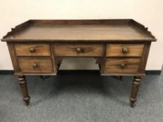 An early Victorian mahogany desk fitted five drawers,