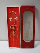 A boxed Chinese Jilin Ginseng root