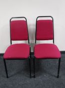 Sixteen metal framed upholstered stacking chairs