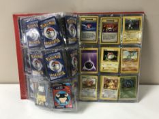 An album of Pokemon and other cards