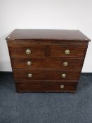 A Victorian mahogany five drawer chest