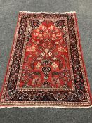 A Persian Kashan rug 195 cm x 125 cm