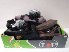 A box of three camera bags, Praktica NTL camera with lens and accessories,