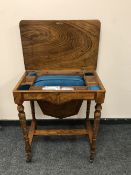 A Victorian inlaid walnut work table