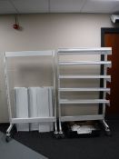 Two sets of metal portable double sided shelves
