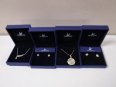 Two boxed pairs of Swarovski Crystal earrings and two boxed Swarovski Crystal necklaces