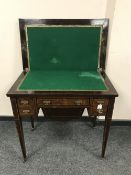 A 19th century inlaid rosewood foldover top lady's work table,