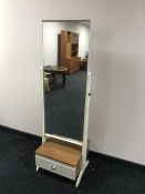 A late 20th century cheval mirror fitted a drawer