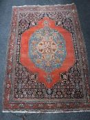 Four Persian woollen rugs CONDITION REPORT: 1st rug - 165cm by 112cm.