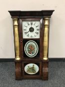 A 19th century gilded mahogany wall clock with enamelled dial