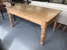 A Victorian style pine dining table
