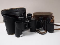 A pair cased of Wray of London 8 x 30 field glasses and a pair of cased Green Kat 8 x 40 field