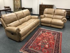 A pair of light tan leather reclining settees : three seater and two seater (2)