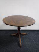 A 19th century mahogany pedestal table
