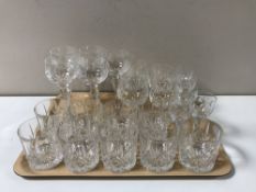 A tray of assorted drinking glasses