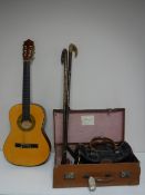 A vintage leather luggage case, a bag of composite bowls,