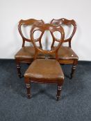 A set of three Victorian shaped balloon backed dining chairs