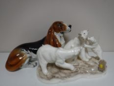 An Italian china figure group of polar bears together with a large china figure of a Bassett hound