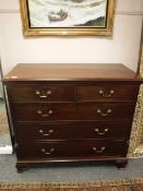 A Victorian mahogany five drawer chest on bracket feet,