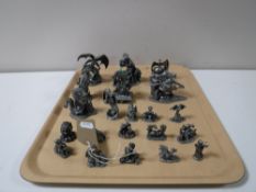 A tray of twenty one pewter dragon figures