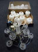 Two boxes containing glass shades together with a decorative nine branch light fitting