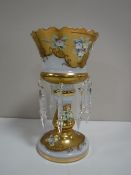 A Victorian glass lustre with drops CONDITION REPORT: Small chip to foot.
