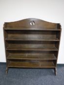 A set of Edwardian oak open bookshelves