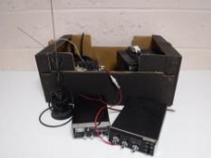 A box containing a quantity of assorted CB radios,