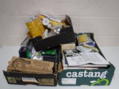 Three boxes containing assorted magicians tricks