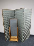 A three way folding room divider together with a child's cheval mirror