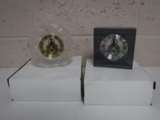 Two boxed contemporary crystal glass clocks