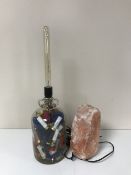 A Saltrock lamp together with a demijohn lamp containing shotgun shells