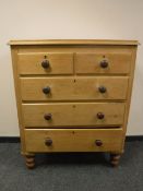 A Victorian pine five drawer chest,