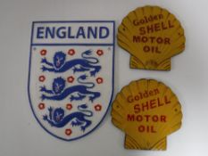 Three cast iron plaques;