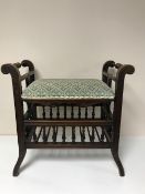 A late Victorian adjustable mahogany piano stool