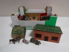 A mid 20th century farmyard play set with lead figures