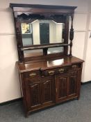 A Victorian mahogany mirror back side board,