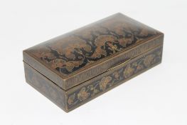 An Indian hand painted brass trinket box.