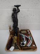 A tray containing a late 19th century spelter figure of a cherub, brass horse,
