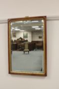 A 19th century walnut and parcel gilt mirror, height 49cm.