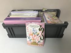Eleven crates containing assorted greetings cards