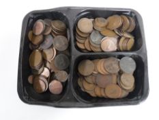 A box containing a quantity of pre-decimal copper coinage